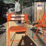 Splasher van and Orange chairs